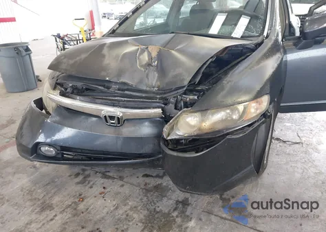 2006 Honda Civic Hybrid from USA, damaged, VIN JHMFA36216S023509